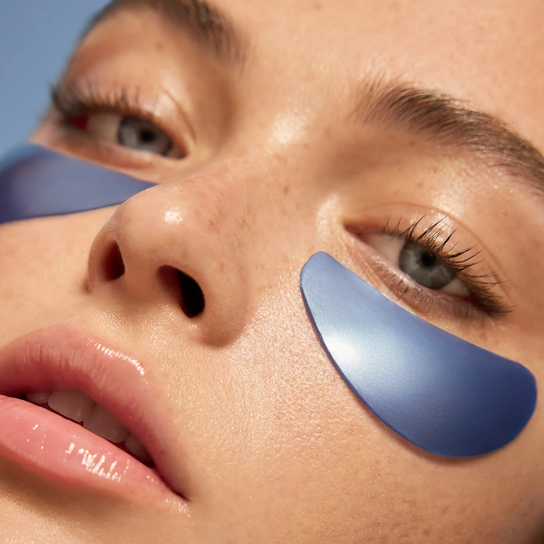 Skincare tool application under eyes